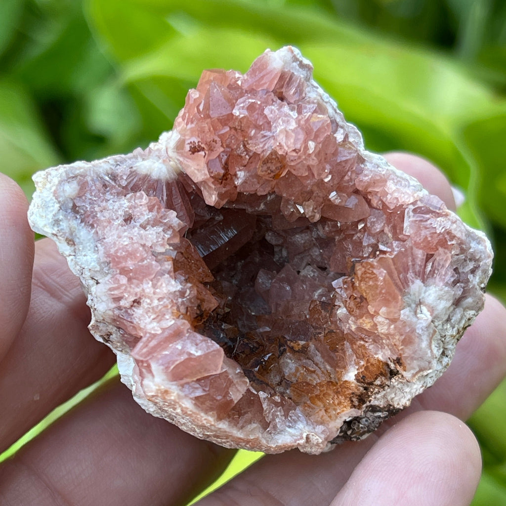 This is a beautiful, juicy pocket of darker Pink Amethyst presenting with a nice shine and hematite with manganese occurrence across the surface of some of the crystals.