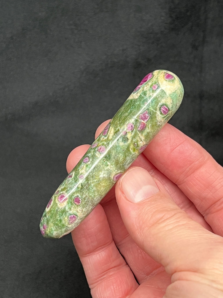 An excellent gift, easy to carry and use.  This polished Ruby Fuchsite massage wand is from the Madikeri area, Kodagu District, Karnataka, India.