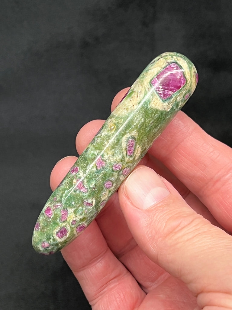 The amount of Chromite, Cr = the combination of Iron Oxide and Chromium, in the Muscovite var. Fuchsite determines the variations and intensities of swirling green colors: from light green to dark green, even dark olive green, presenting a striking contrast with the rubies.