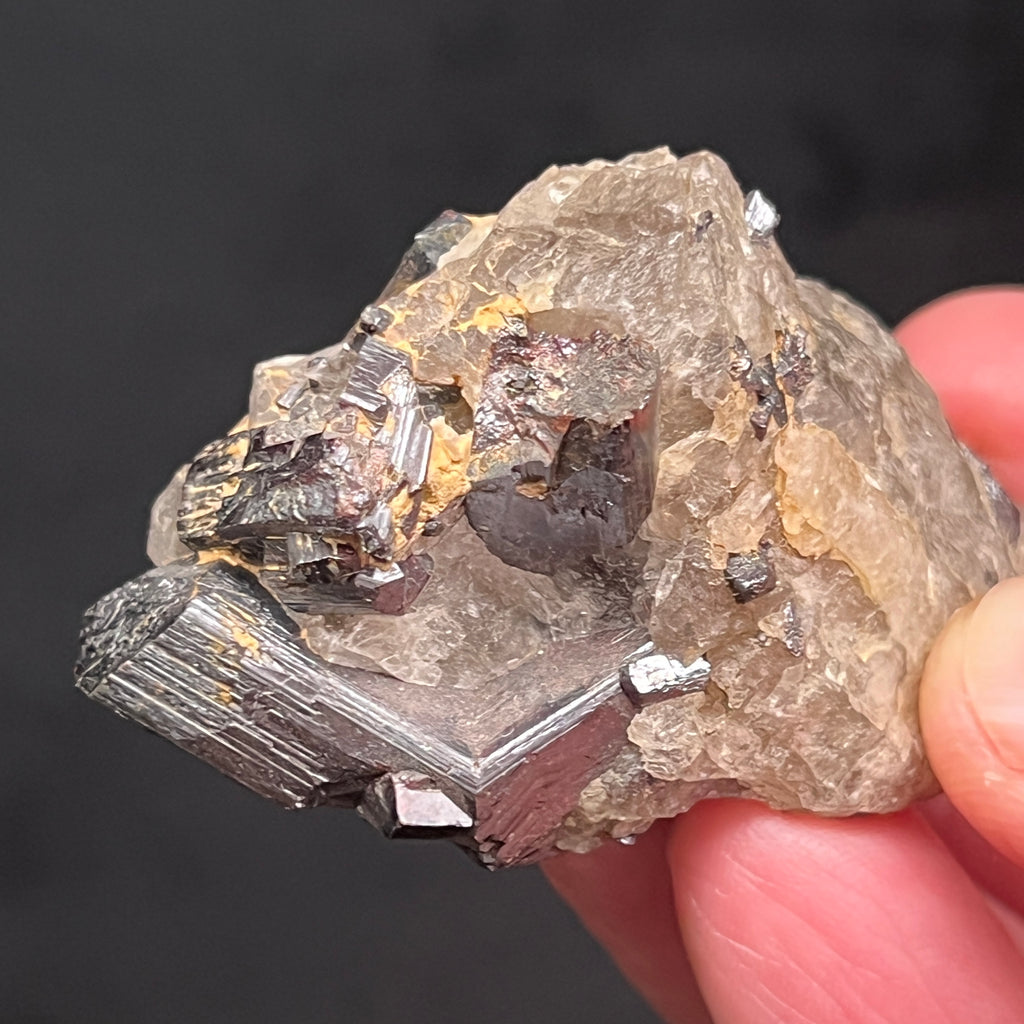 This is an excellent example of larger sized, thicker, well formed geniculate twin, nicely terminated rutile.  This specimen presents with a secondary growth rutile crystal almost on the "knee" or "elbow" of the twin formation.