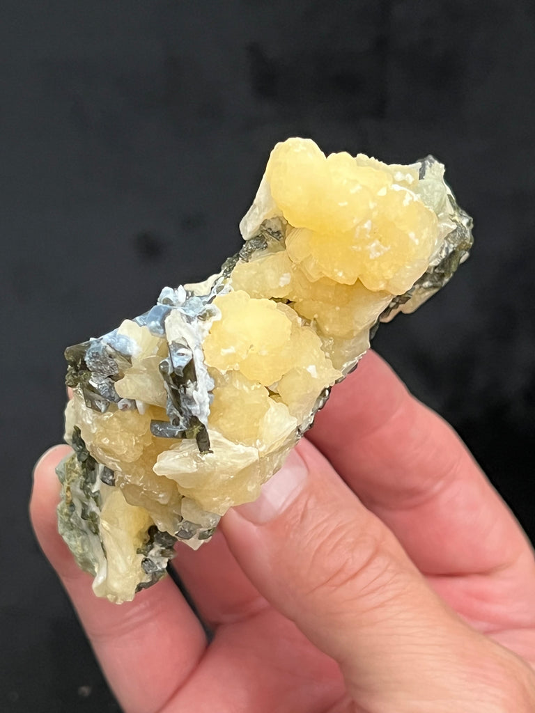 Truly a curious, intriguing uniquely beautiful Stilbite with Epidote combo piece for any collection. The source for this unusual yellow Stilbite and Epidote is Songounikoura, Diakon, Arrondissement of Diakon, Bafoulabe' Cercle, Kayes Region, Mali.