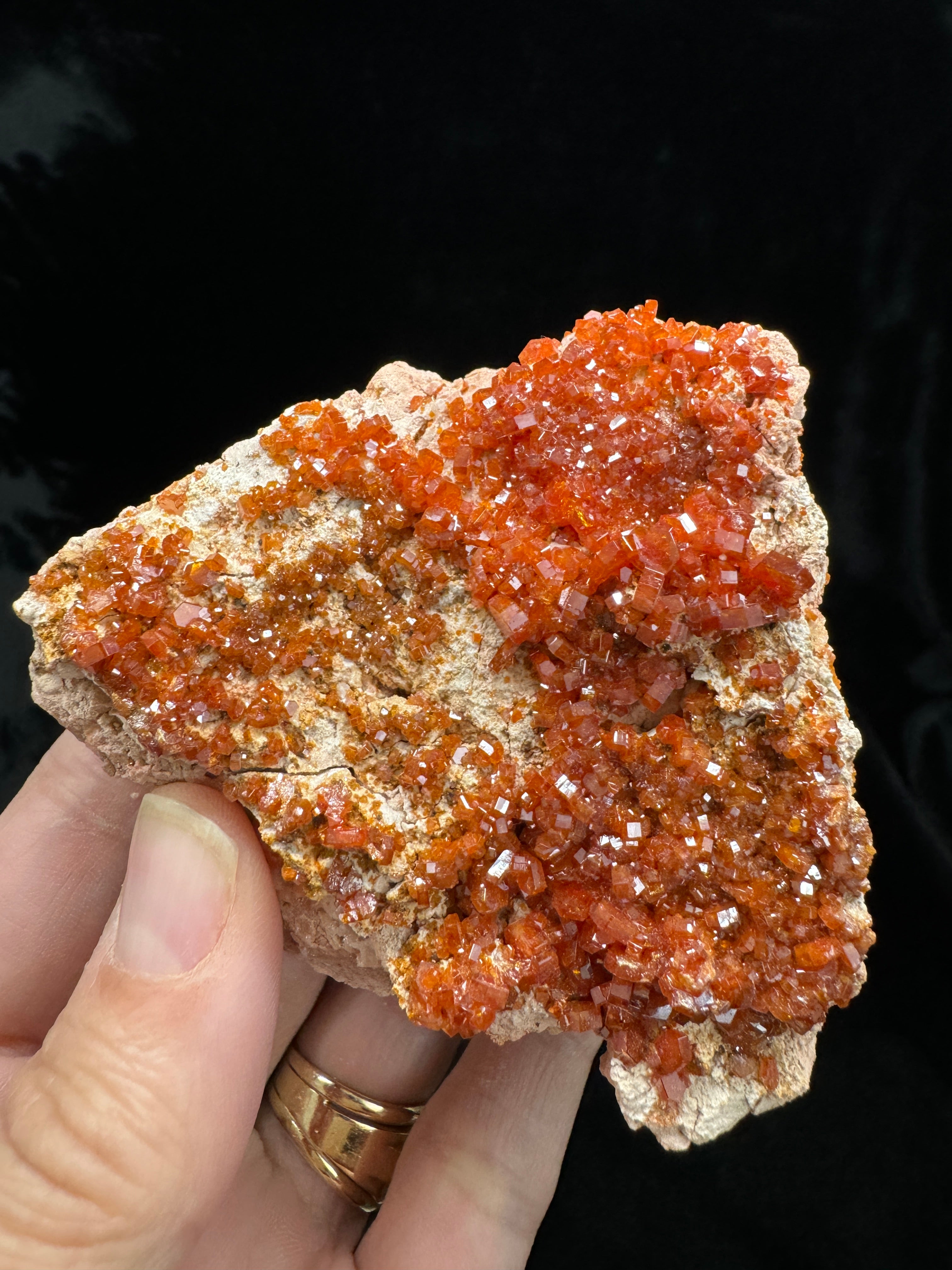 Here's a gorgeous Vanadinite Crystals on Matrix. Shows a fine stress line that is stable and does not take away from the integrity of the specimen.