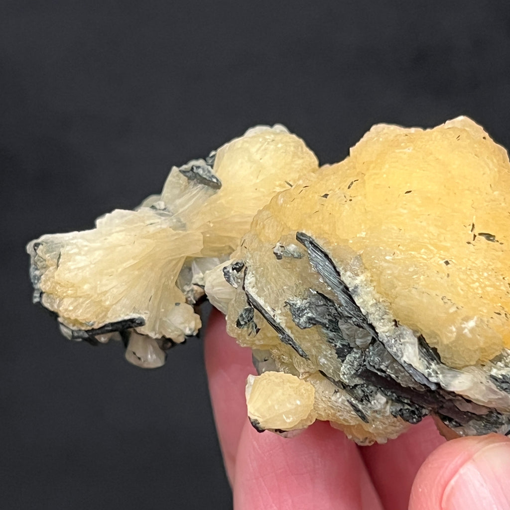 This is a yellow Stilbite in rare bowtie form and a cluster that presents as a cauliflower ball form, with Epidote throughout the piece from Bafoulabe' Cercle, Kayes Region, Mali.