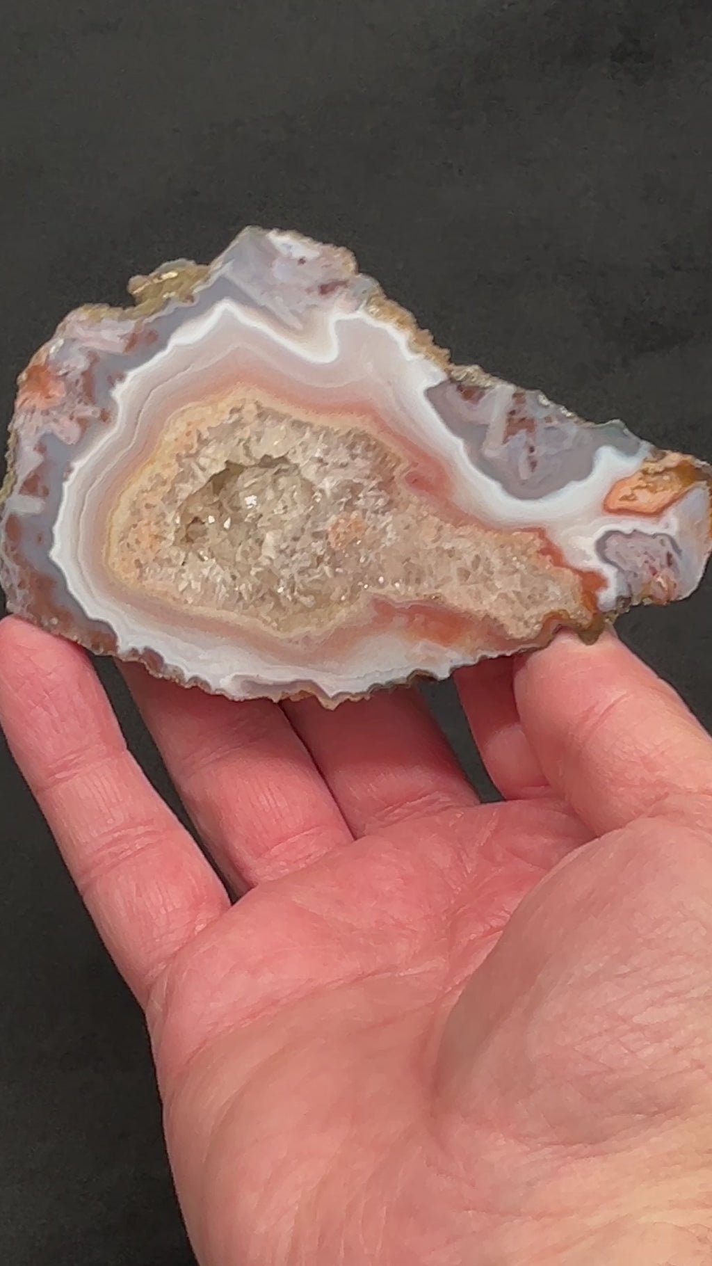 Agate is primarily a microcrystalline quartz var. chalcedony most frequently found within volcanic and metamorphic rocks.  Moroccan Agates like this one often feature many different formations, patterns, structures and an incredible variance of colors.   