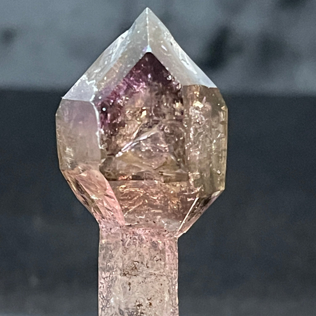 Zonation in this Smoky Quartz variety Amethyst is primarily smoky root beer color with a beautiful, soft violet to violet-purple Amethyst color in the faces of the secondary crystal. 