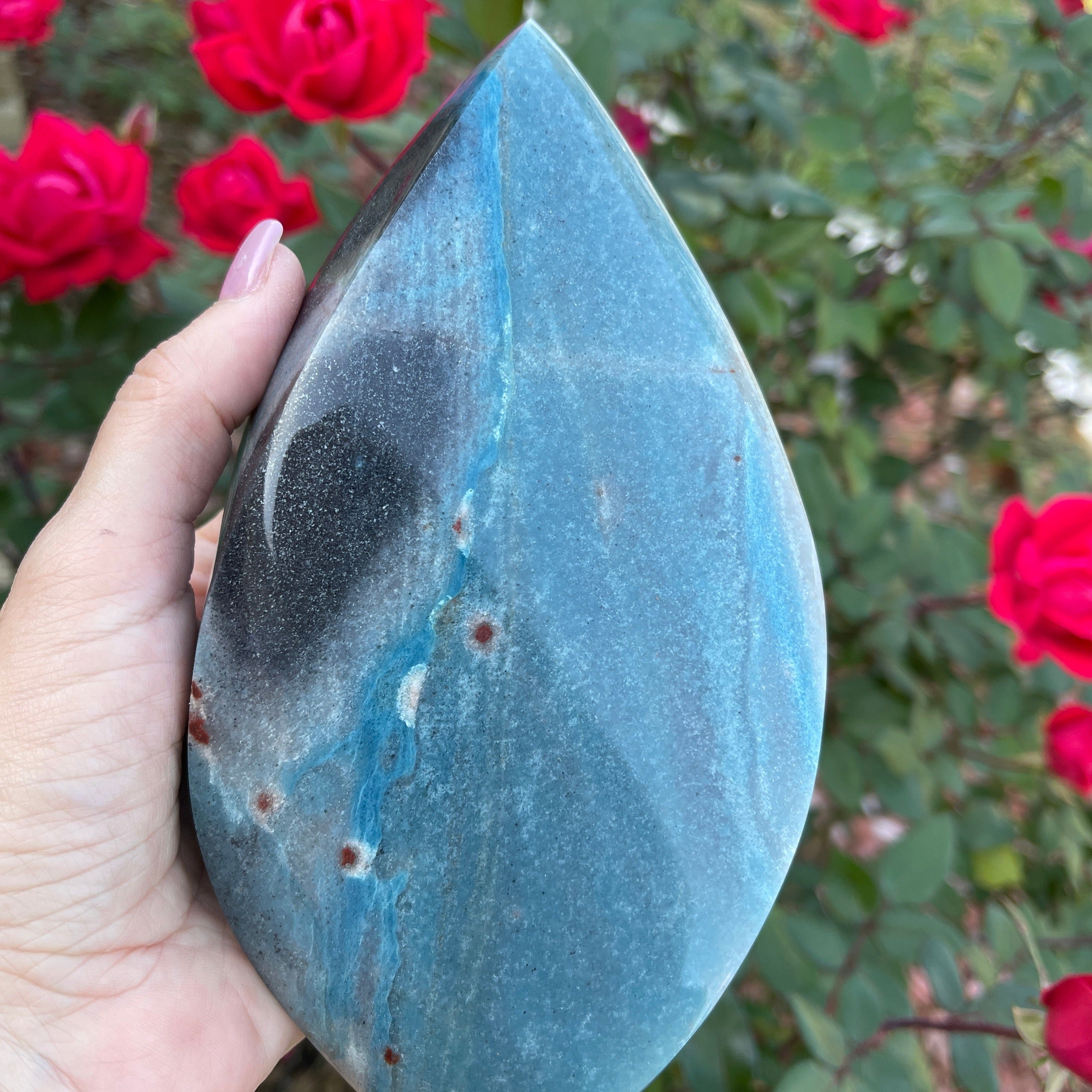 This is a high quality Trolleite Flame exhibiting an excellent blending of rich blue colors, sky blue, indigo blue to a deep, dark blue-black, and a fine polish.