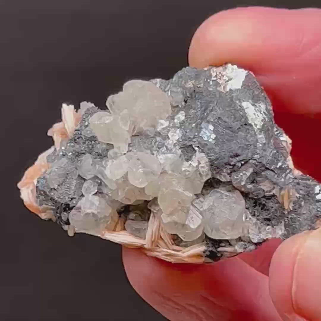 In addition to occurrences of twinning Cerussite crystals, some of the Cerussite crystals in this specimen are UV reactive; they fluoresce a cream-yellow when under UV light.