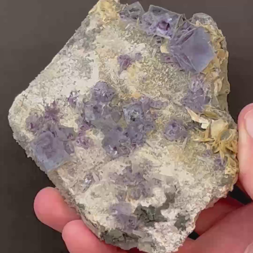 There are many beautiful wonders to discover and explore in this fine Fluorite, Needle Quartz, and bladed Siderite specimen. The source for this quality Fluorite and Needle Quartz specimen is the Huanggang Deposit, Inner Mongolia, China.