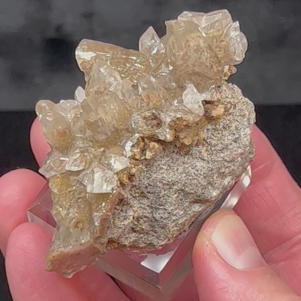 This is an outstanding Calcite with Todorokite inclusions specimen to display or add to a collection, it has excellent clarity and transparency.