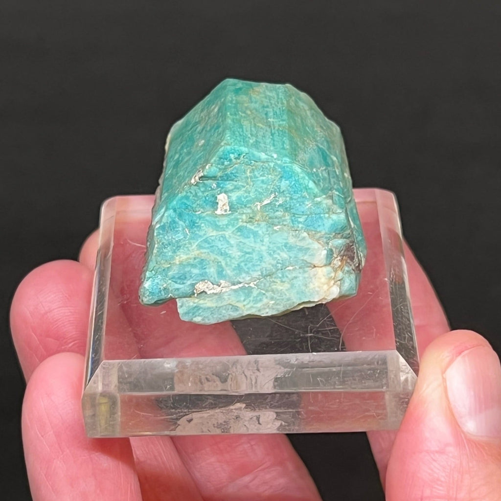 This is a fine specimen example of Amazonite, a blue-green mineral that is actually a variety of potassium rich feldspar called microcline exhibiting a prismatic crystal habit.