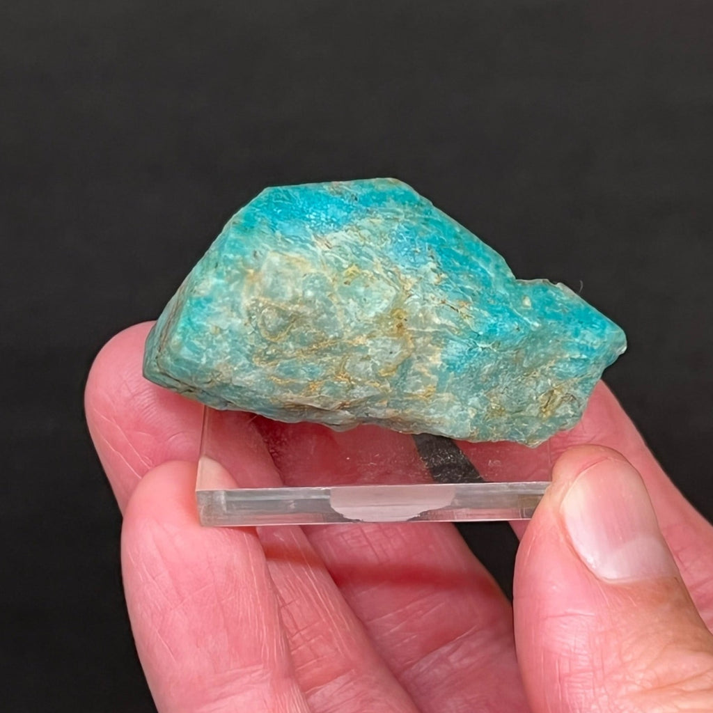 This is a fine specimen example of Amazonite, a blue-green mineral that is actually a variety of potassium rich feldspar called microcline exhibiting a prismatic crystal habit.