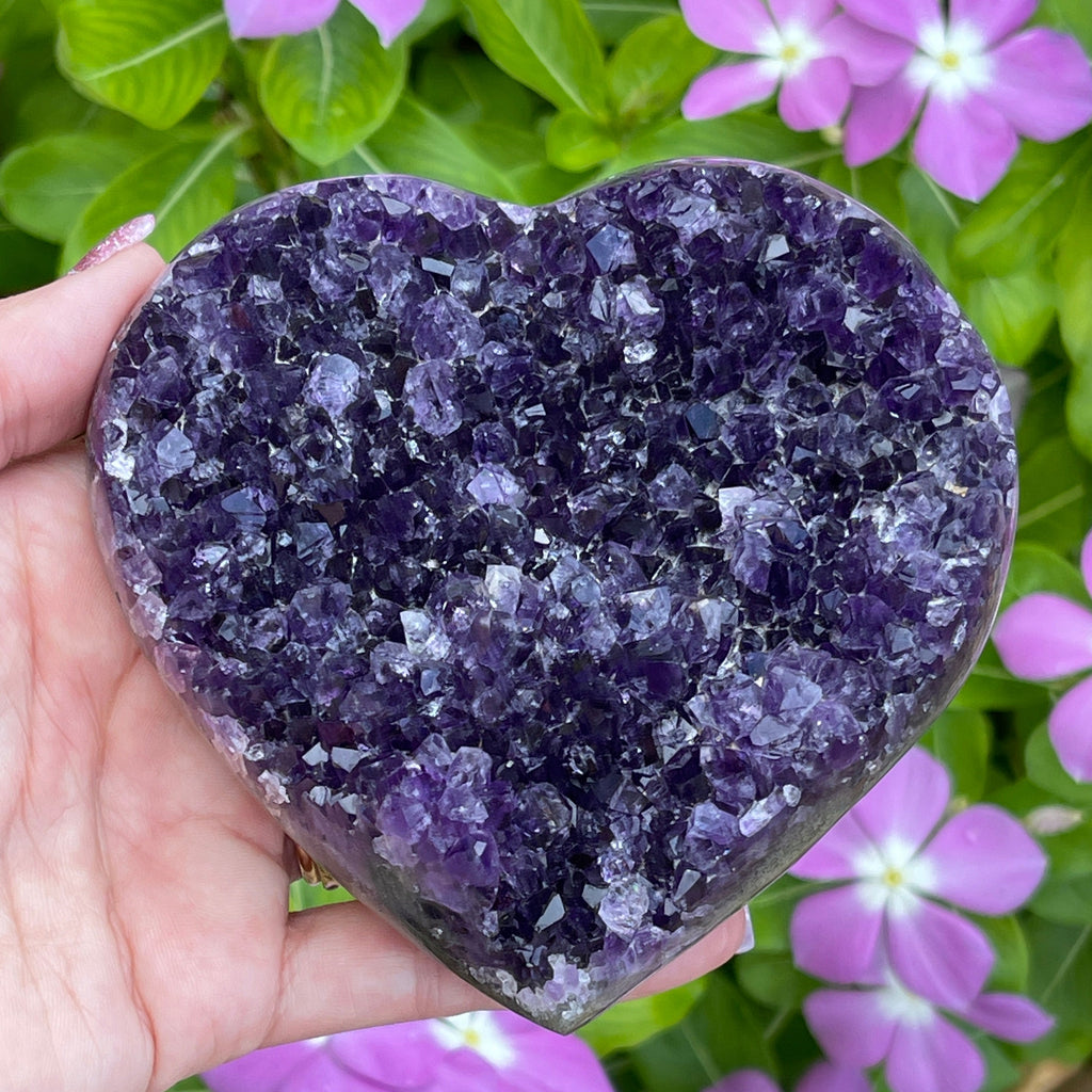 Beautiful, deeply saturated purple Amethyst Crystal heart.