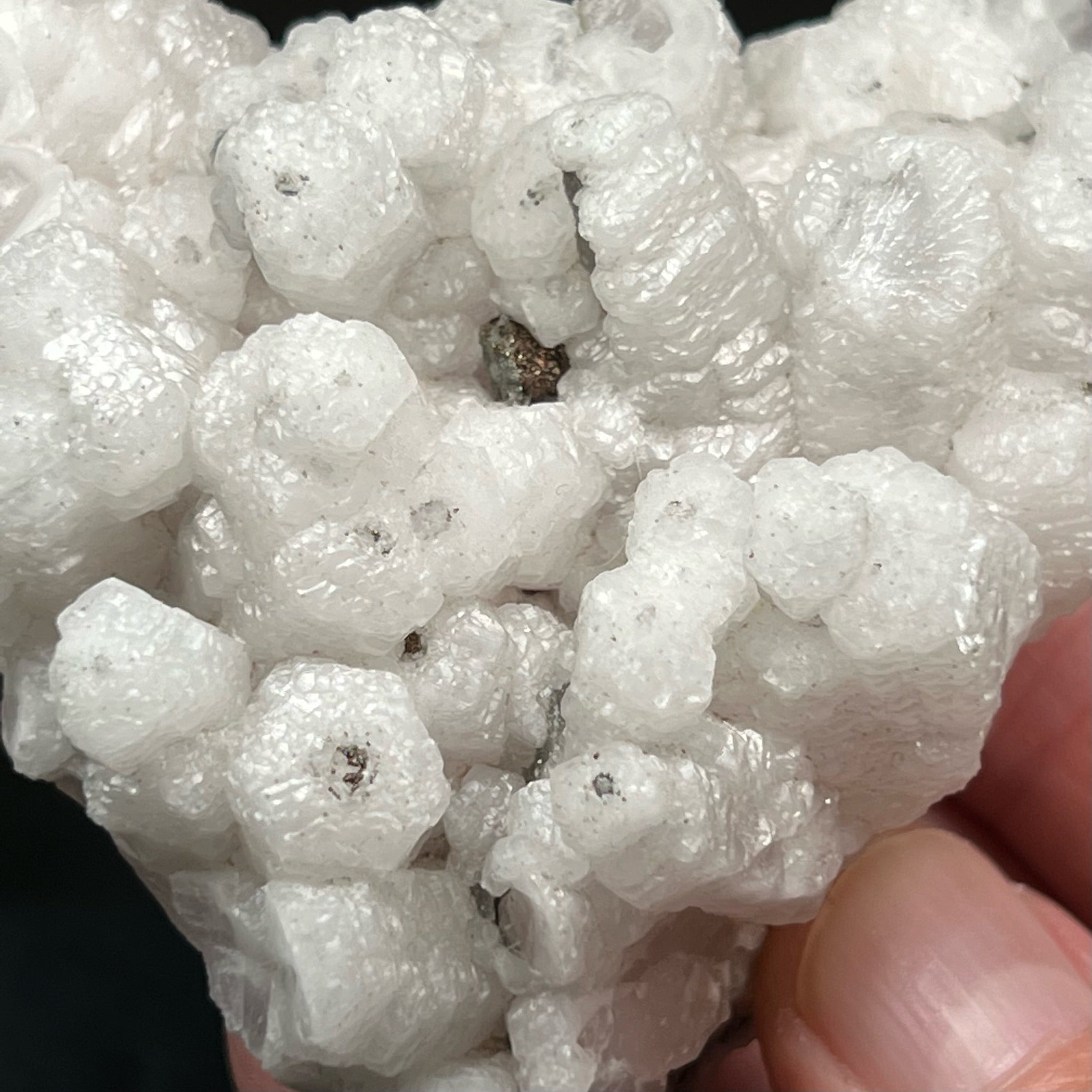  The dot in the centers of the columns of Poker Chip Calcite is Pyrite and Chalcopyrite. 