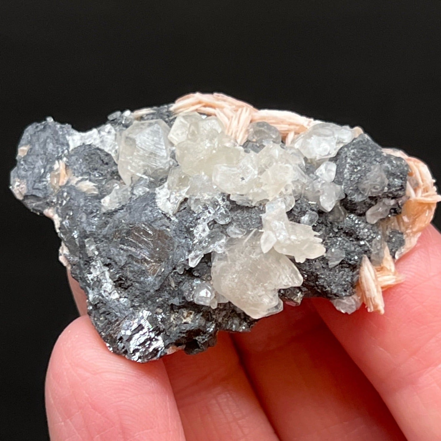 Overall this is a fine example of twinning Cerussite crystals, orange Barite, and Galena in a quality specimen to fill your collection with the Cerussite crystals you need. 