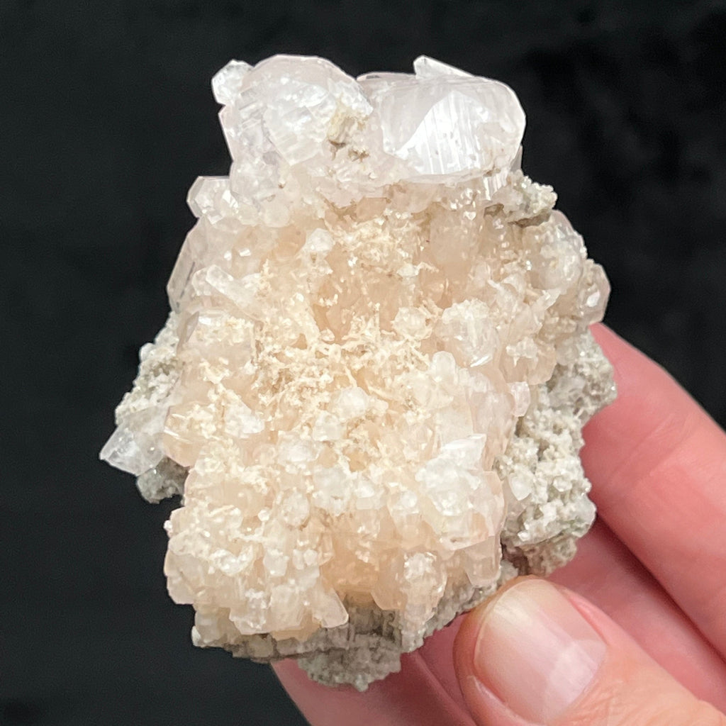 This outstanding Calcite specimen is very lustrous!
