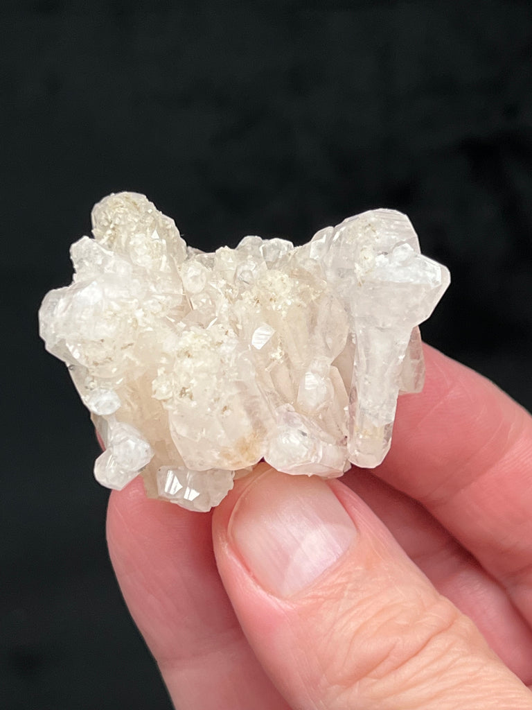 This is a fascinating, very lustrous, unusual specimen with elongated, scepter-like formations of Calcite growth. 