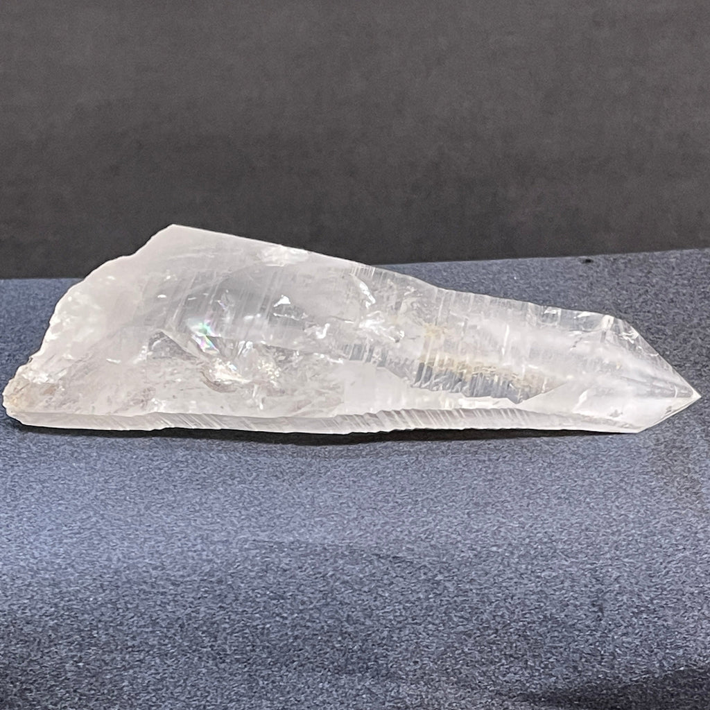 Columbian Quartz Crystal Point laser with good clarity and striations.