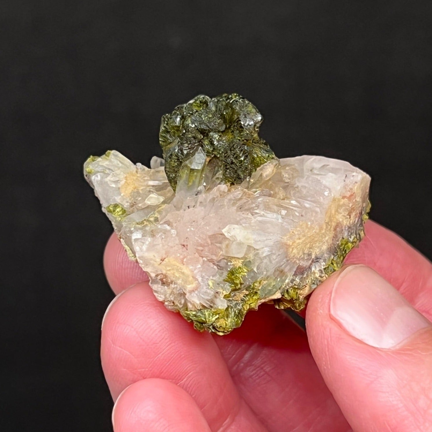 While the luster and formation of the Epidote crystals on this specimen are exceptional, the Quartz crystals exhibit excellent quality, water clear transparency and fine terminations.  