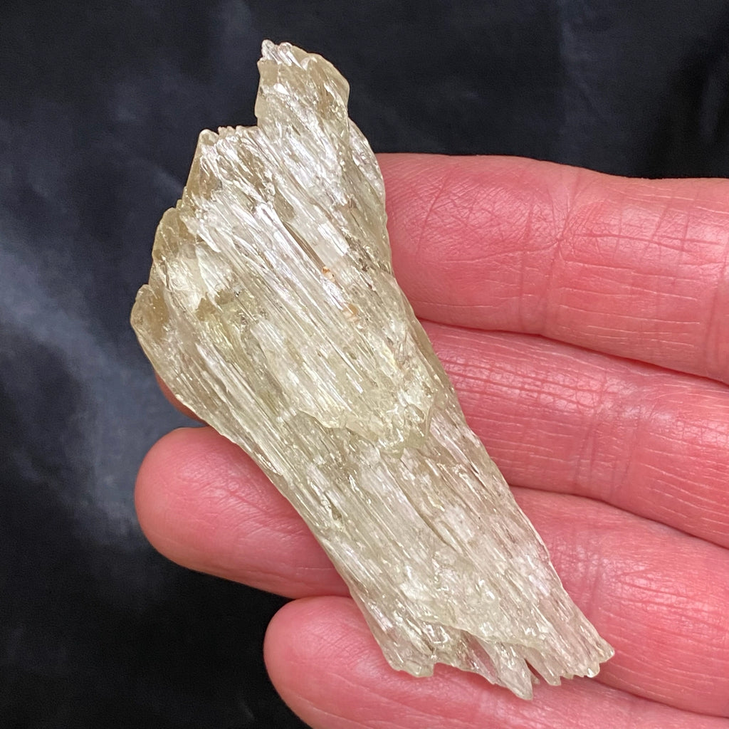 This Spodumene var. Kunzite / Hiddenite crystal is a higher quality example with natural etching, hence its interesting texture and surface features.