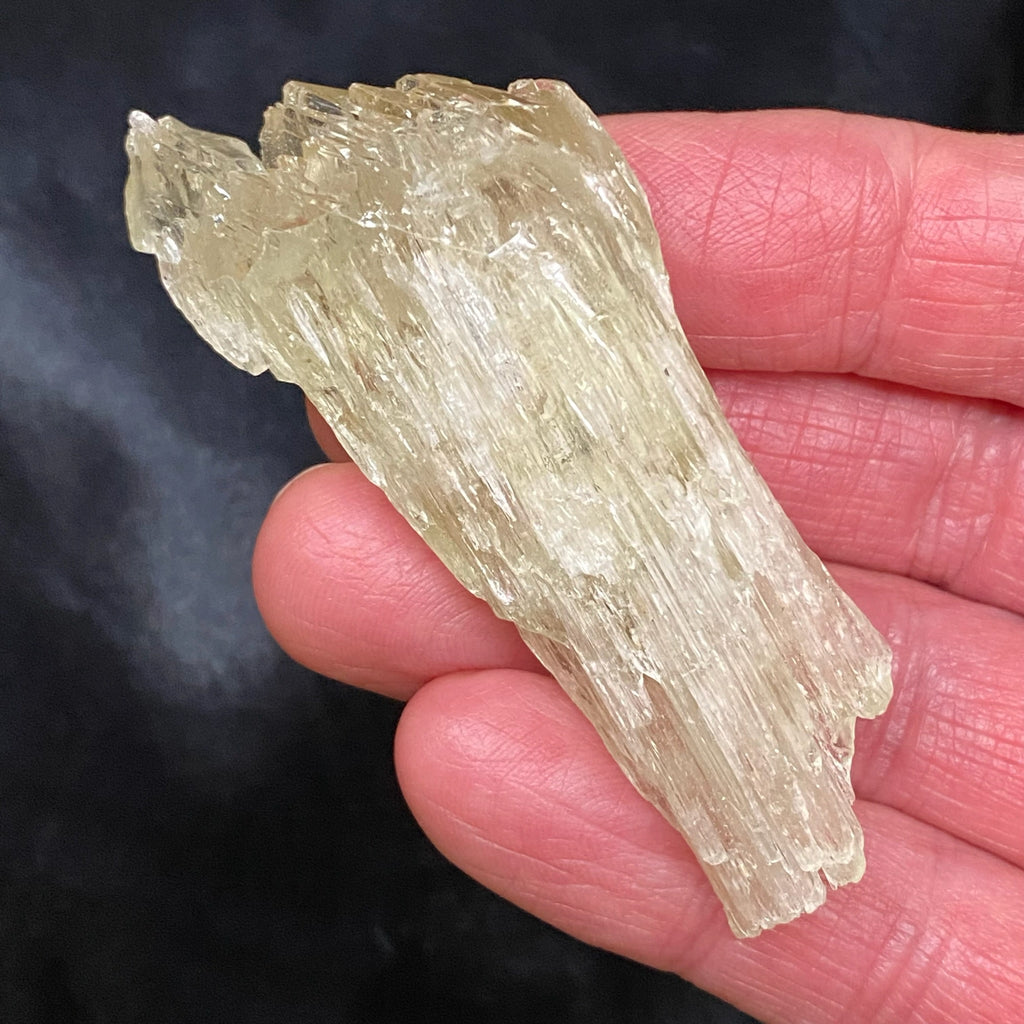 This is a beautiful green, lustrous Spodumene var. Kunzite transparent / translucent specimen from Pakistan that is often referred to as "Hiddenite". 45 grams. 2.87" x 1.32" x .74" or 73mm x 33.6mm x 18.8mm.