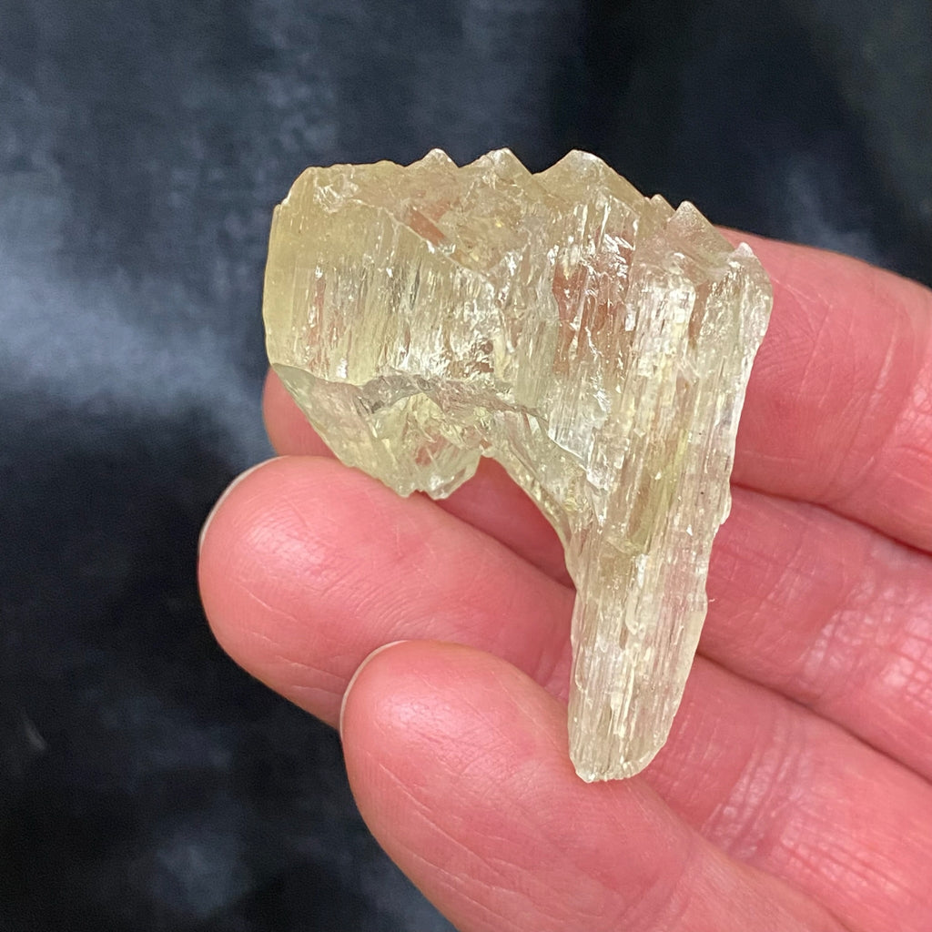 This Spodumene var. Kunzite / Hiddenite crystal is a higher quality example with natural etching, hence its interesting texture and surface features. 