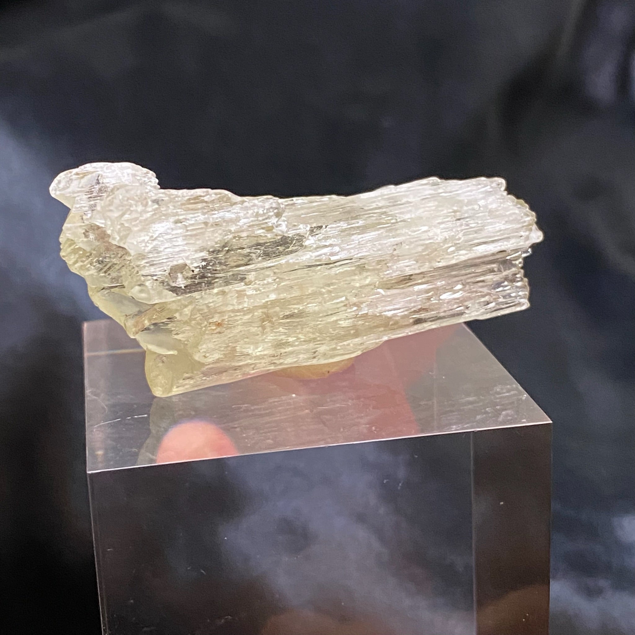 This Spodumene var. Kunzite / Hiddenite crystal is a higher quality example with natural etching, hence its interesting texture and surface features.  