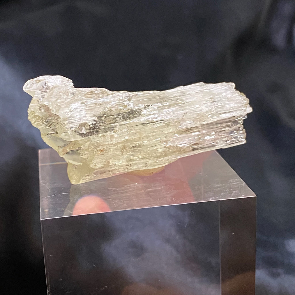 This Spodumene var. Kunzite / Hiddenite crystal is a higher quality example with natural etching, hence its interesting texture and surface features.  