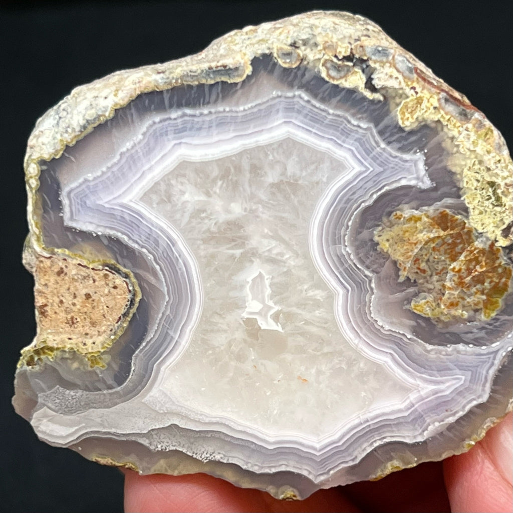 The wispy, quartz var. chalcedony crystalized centers of both sides of this Laguna Agate thunderegg are gorgeous.