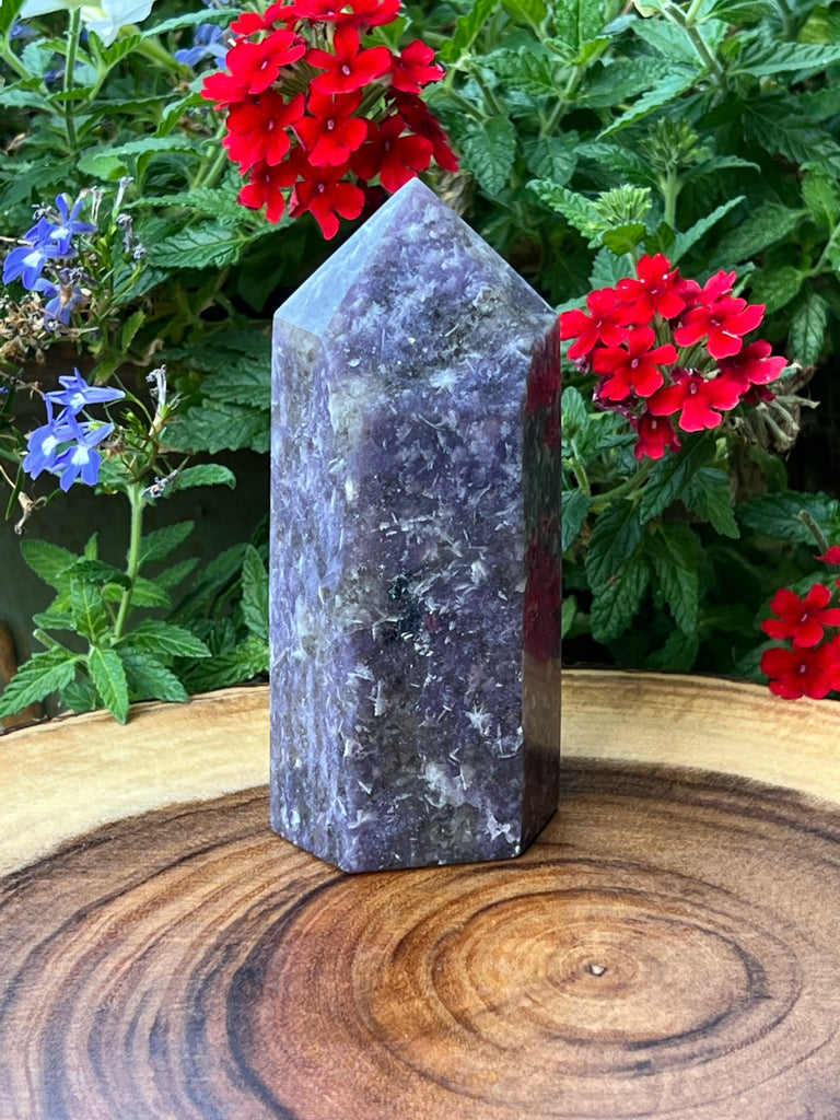  Interestingly, the color of this Lepidolite obelisk presents a little more blue in hue when photographed outdoors, at different angles, in even light, out of the sunlight, exhibiting pleochroism.