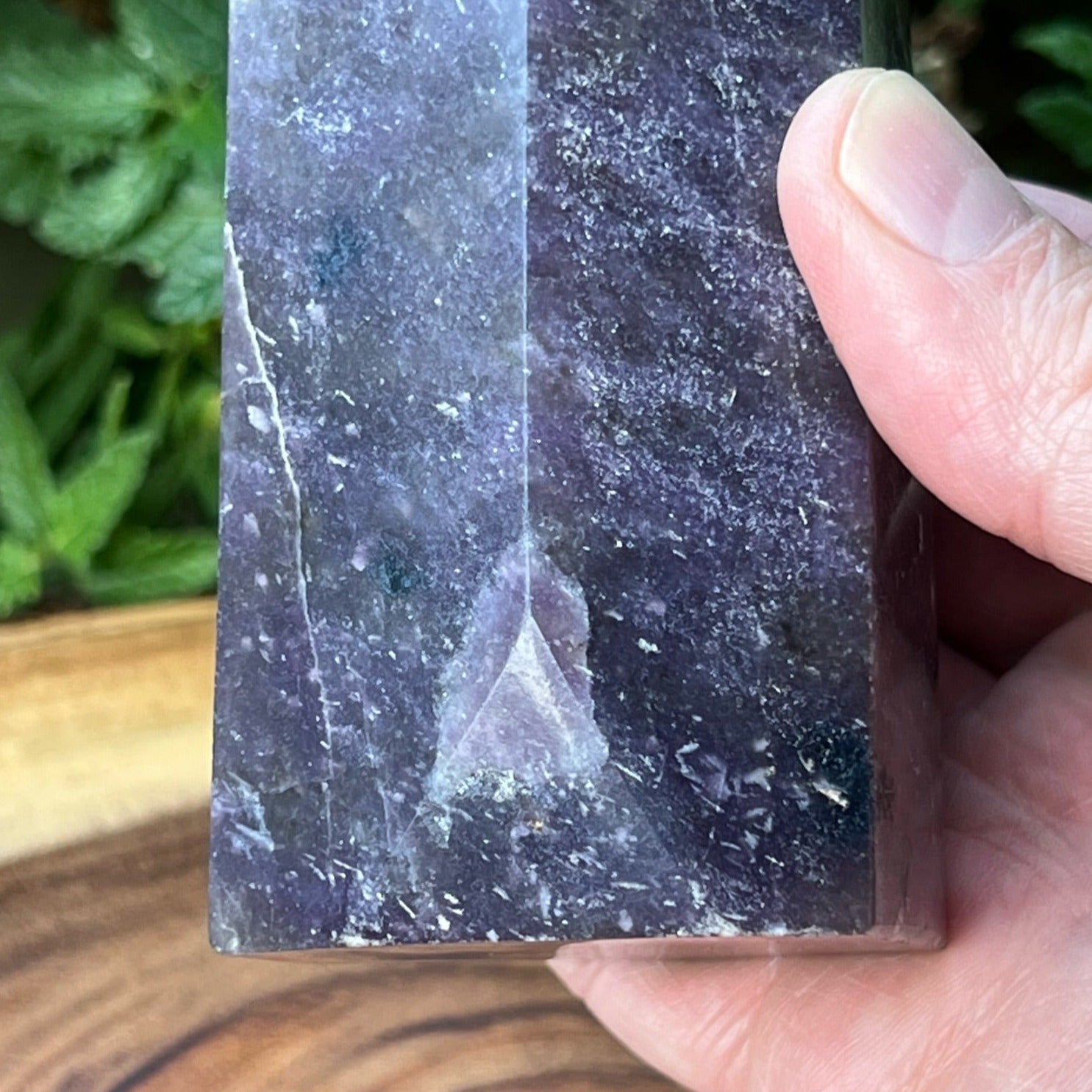 There is an unusual, "extra" beveled and polished face near the base of this Lepidolite obelisk, something we've never seen before on a tower or obelisk, giving this one a special, unique quality. 