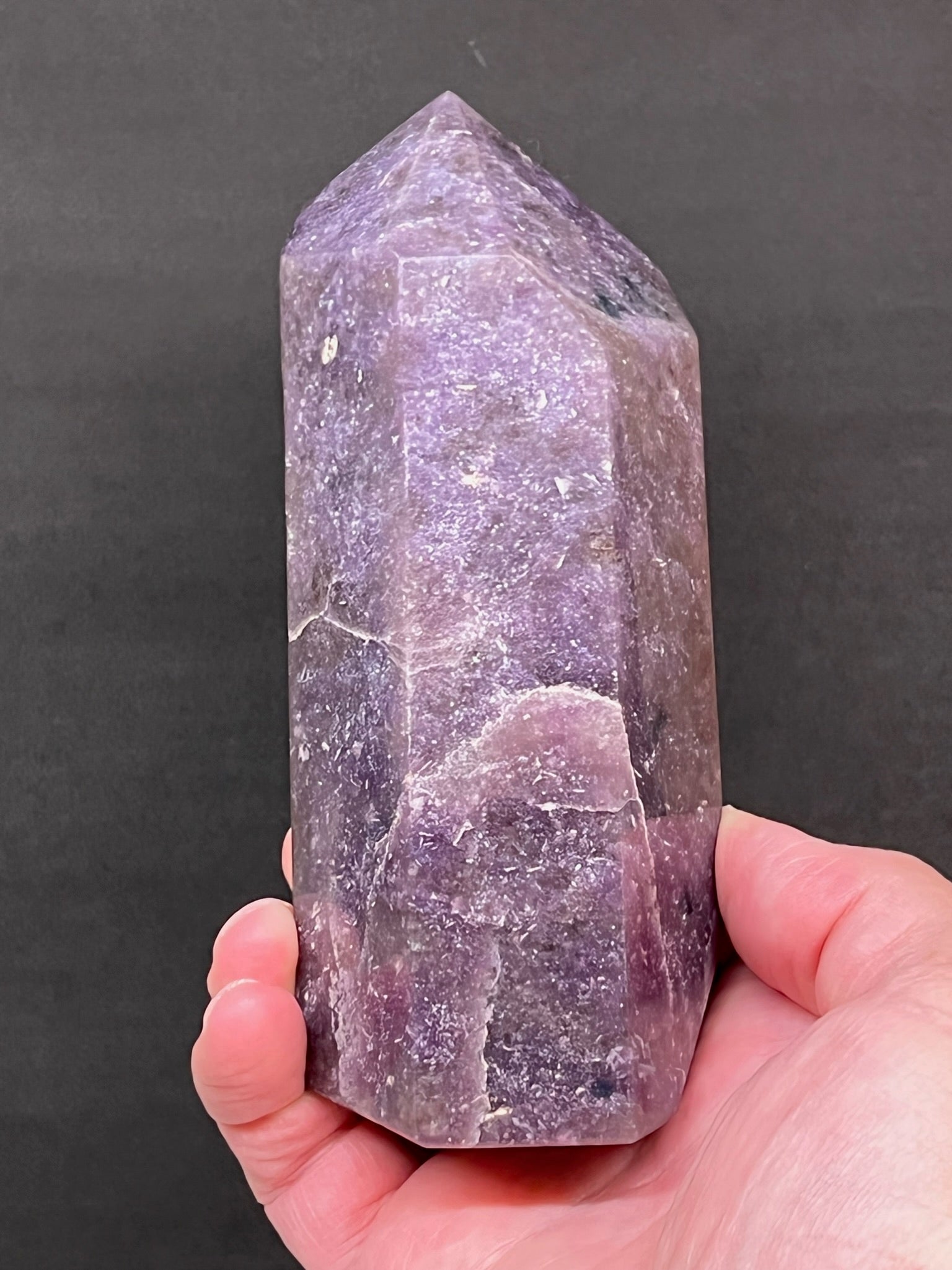 This beautiful Lepidolite obelisk displays beautifully from any angle.