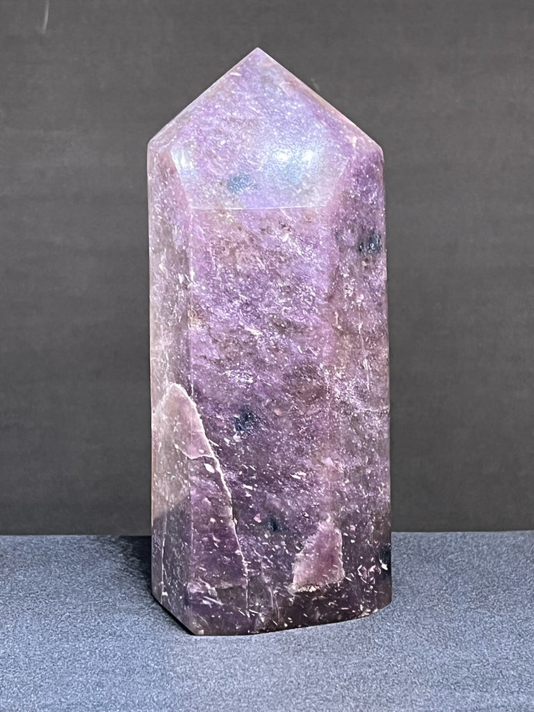 The polish on this Lepidolite obelisk is excellent, exhibiting a nice shine. 