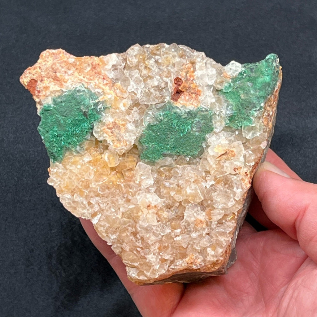 This is an excellent Malachite Included Quartz specimen with three prominently displaying areas of fibrous Malachite and minor occurrences of Cerussite nestled in across the surface of the cabinet size piece. 