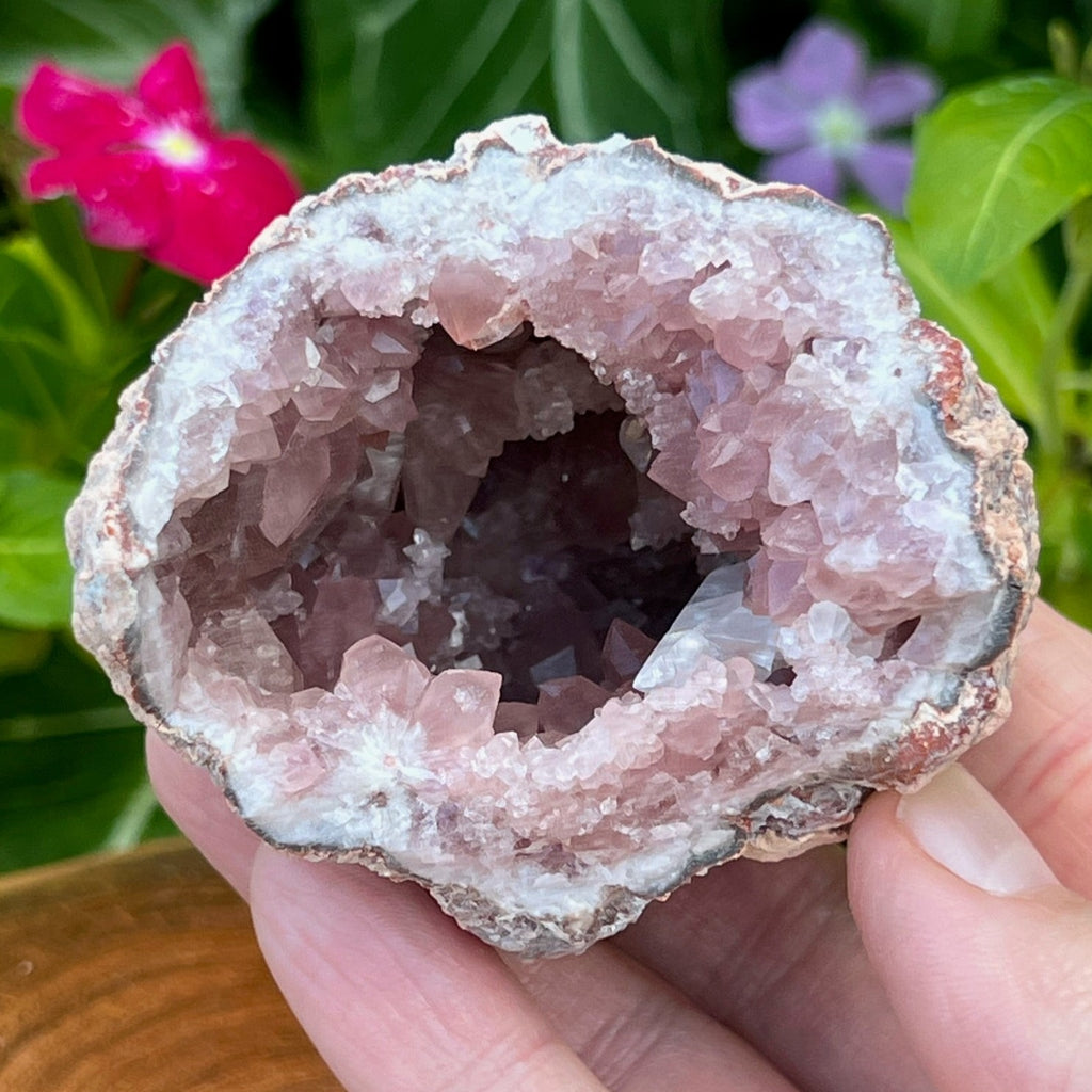 Varying saturations of pink color are evident throughout this specimen, with the darker pink crystals representative of higher quality Pink Amethyst.