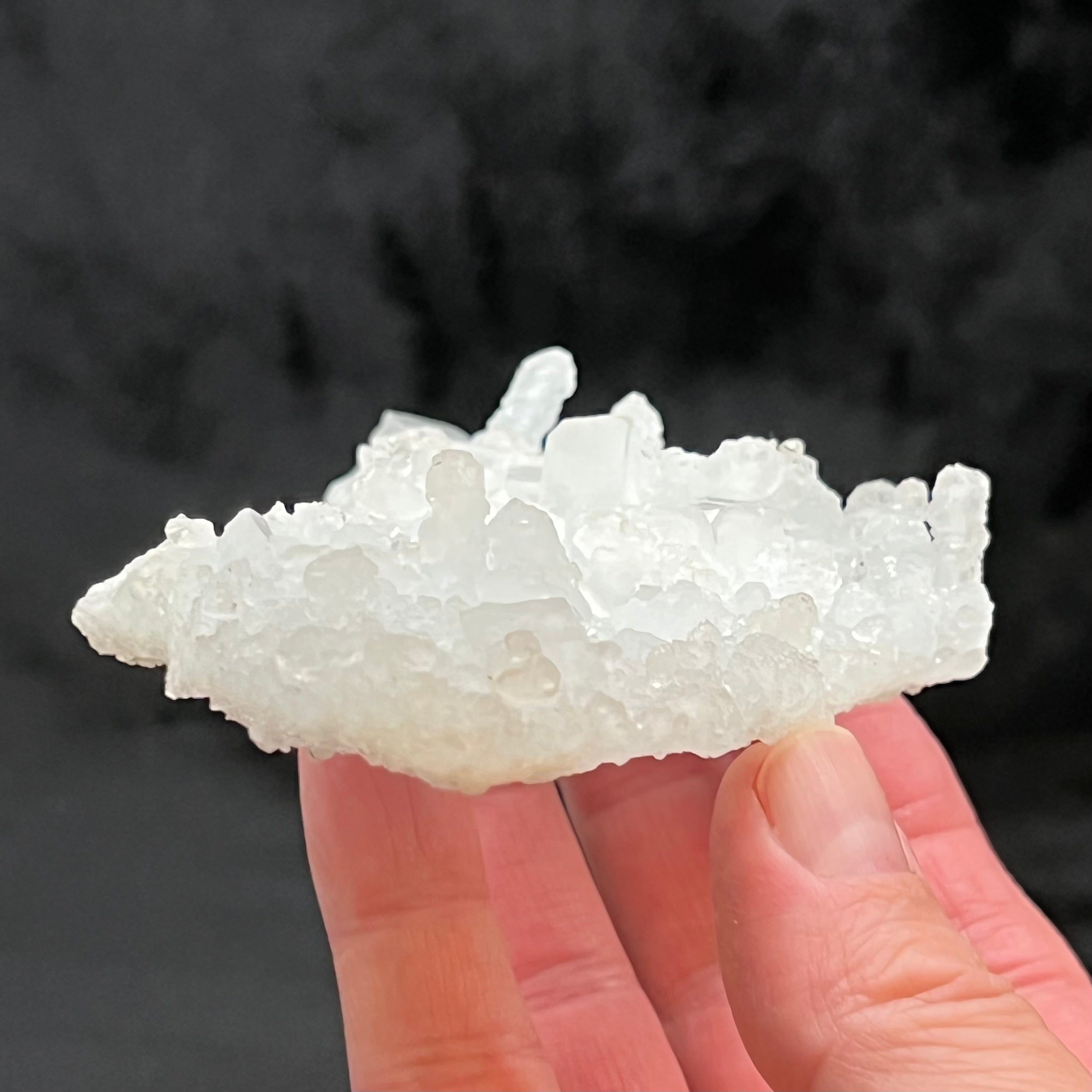 This Prehnite pseudomorph after Laumontite specimen exhibits a really cool icy presence.