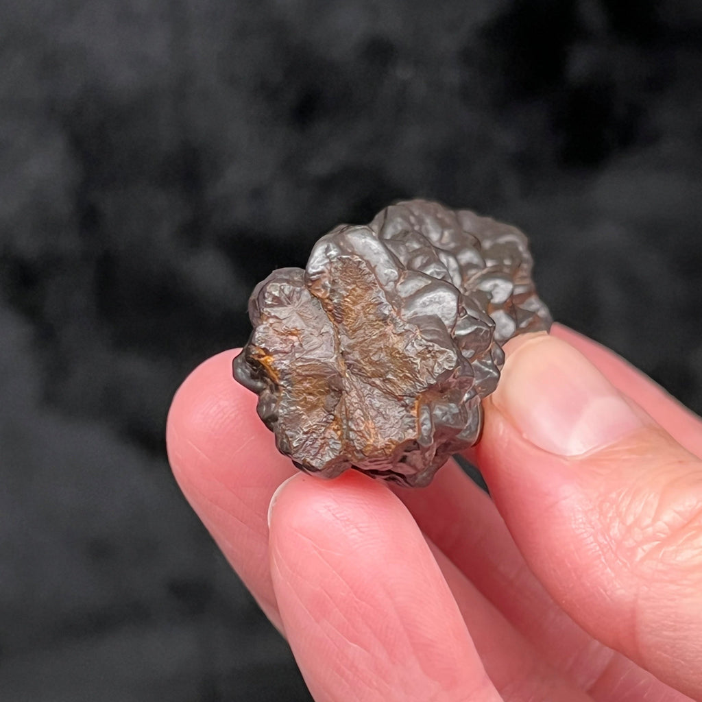 This is an exceptional pseudomorph, a mineral having the characteristic outward form of another species, Hematite-Goethite After Marcasite-Pyrite. It’s origin or original crystal formation or structure stays or maintains from the Marcasite-Pyrite, but has morphed and the molecules transformed completely into something else!