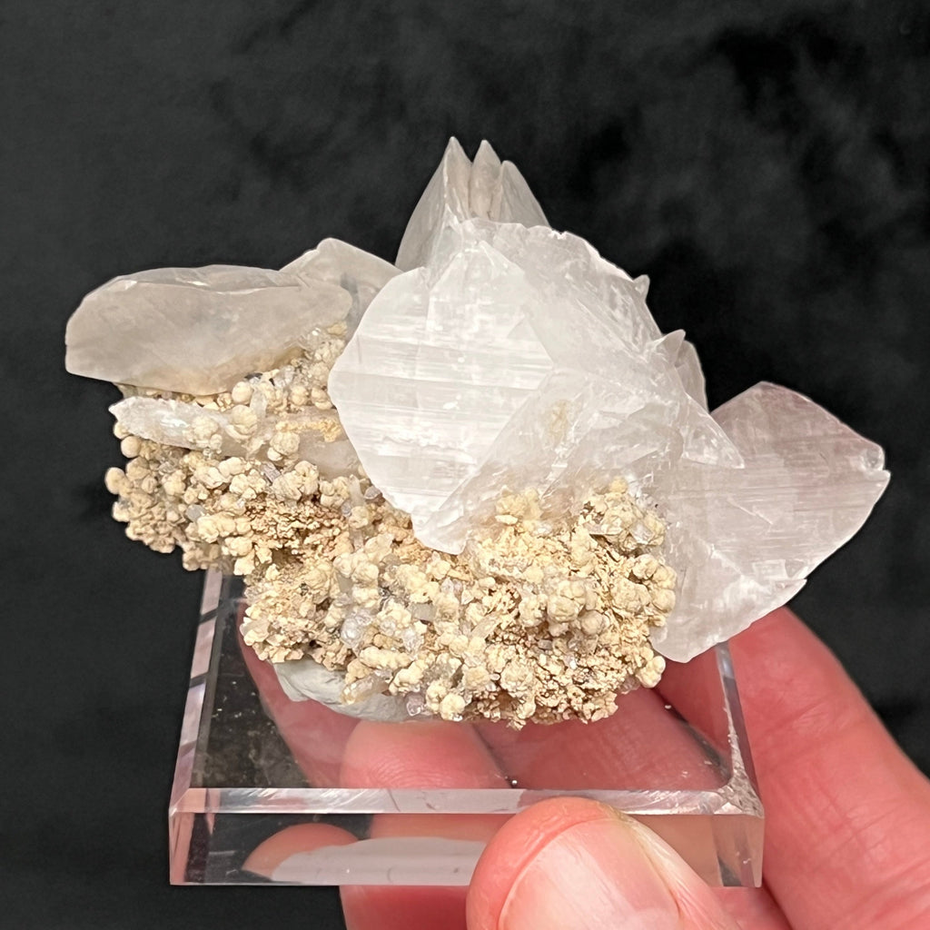 This is a gorgeous, lustrous Calcite with Chalcopyrite specimen featuring "poker chip" wafer-like rhombohedron crystals exhibiting an overall flower-like formation.