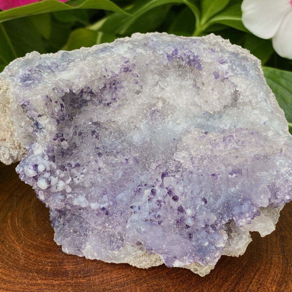 Spirit Flower Geodes are all natural and composed of a blend of botryoidal Chalcedony, Dark Blue Fluorite and druzy Quartz crystals.
