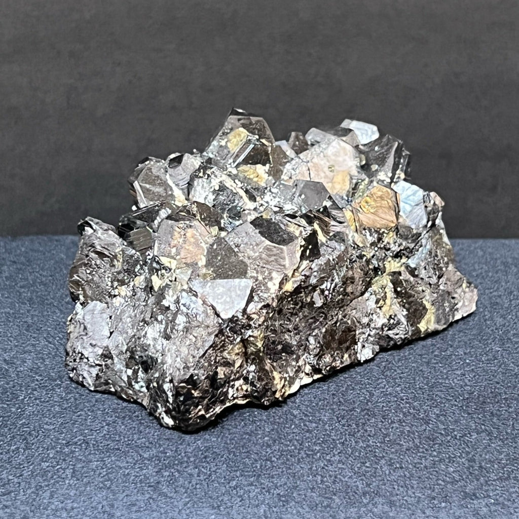 Depending on the angle of this Sphalerite specimen in relationship to the light directed on it, the entire piece can appear mirror reflective.