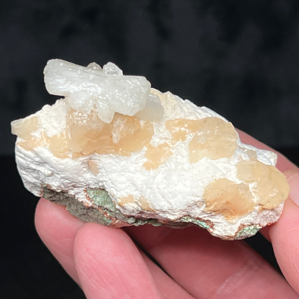 The bow tie Stilbite appears to be growing on the Heulandite that is growing on the Mordenite to present as an attractive, multi-layered specimen.