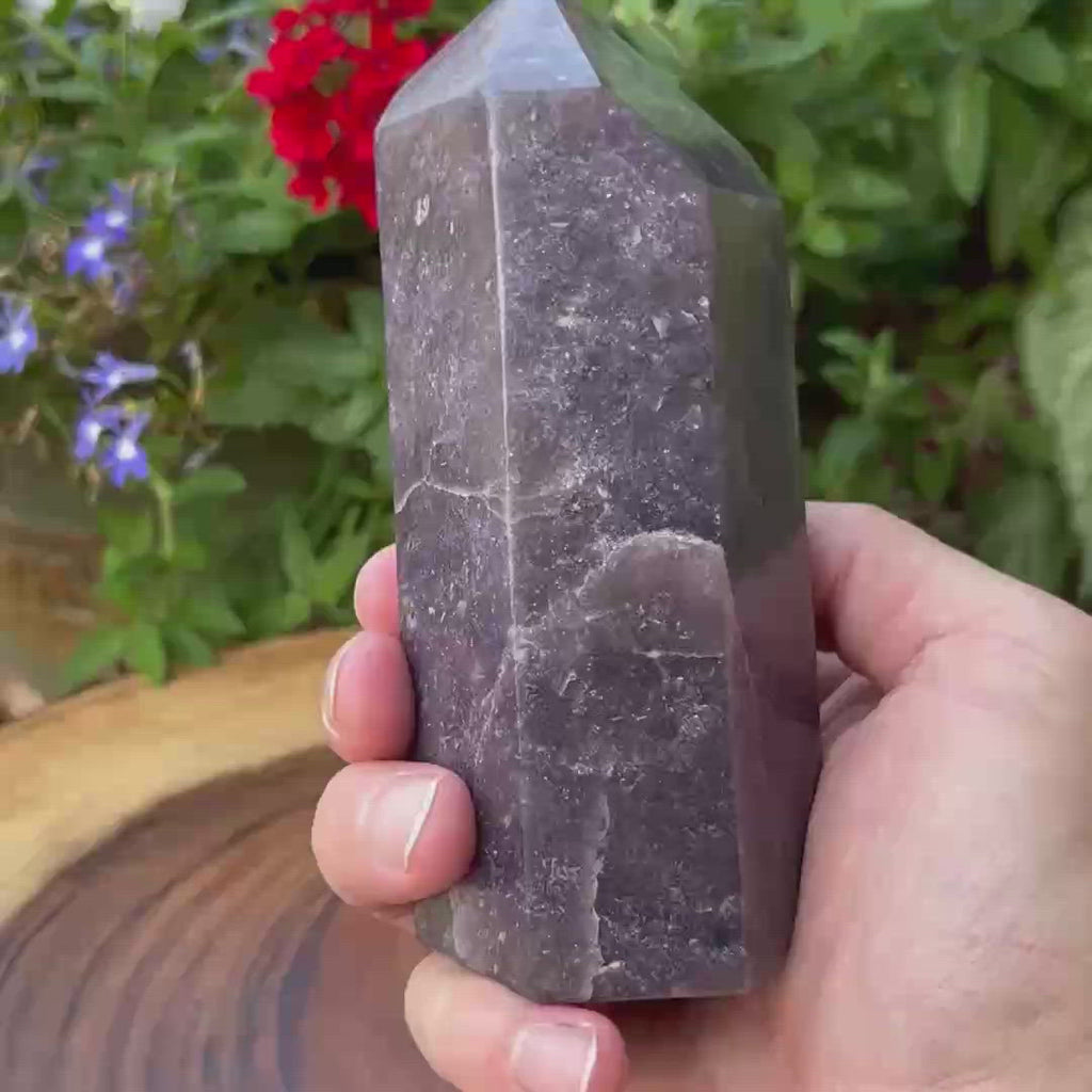 The Quartz in this Lepidolite has fascinating, varying green-gray to dark green hues, due to the presence of Chromium. Because lithium is colorless, the light lilac to purple to deep bluish-purple hues in Lepidolite are attributed to the varying saturations of Manganese.  Another attractive Lepidolite tower!