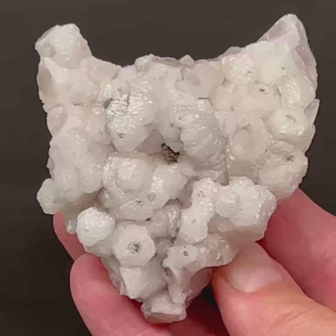As if these features aren't attractive enough, the Calcite glows a nice shade of pink under UV light! This uncommon Columnar Poker Chip Calcite specimen will make an excellent addition to your collection.
