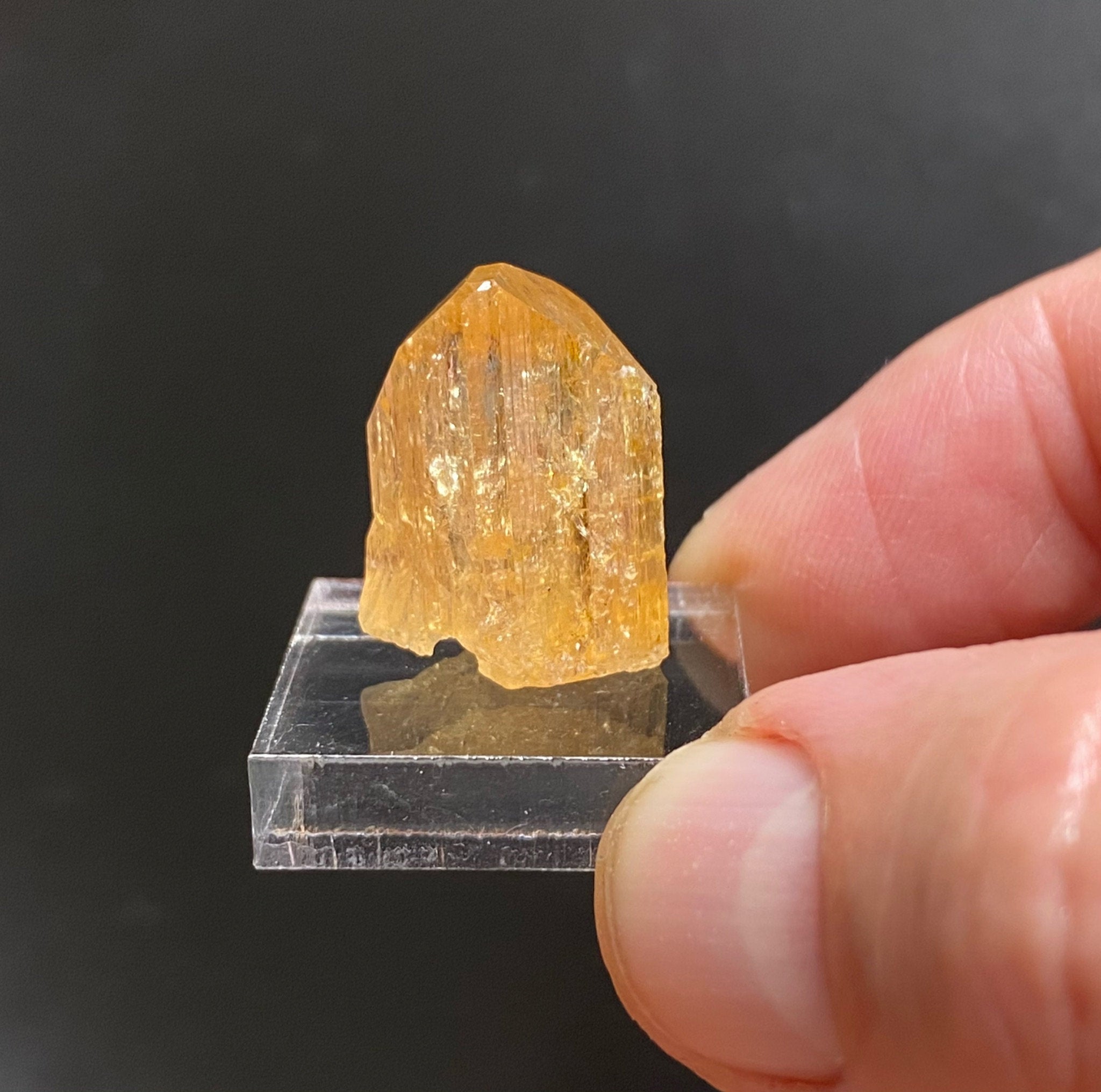Topaz var. Imperial. The source for this fine Topaz is the Solwezi District, North-Western Province, Zambia. 100% natural. High quality, rare specimen. 8 grams.
