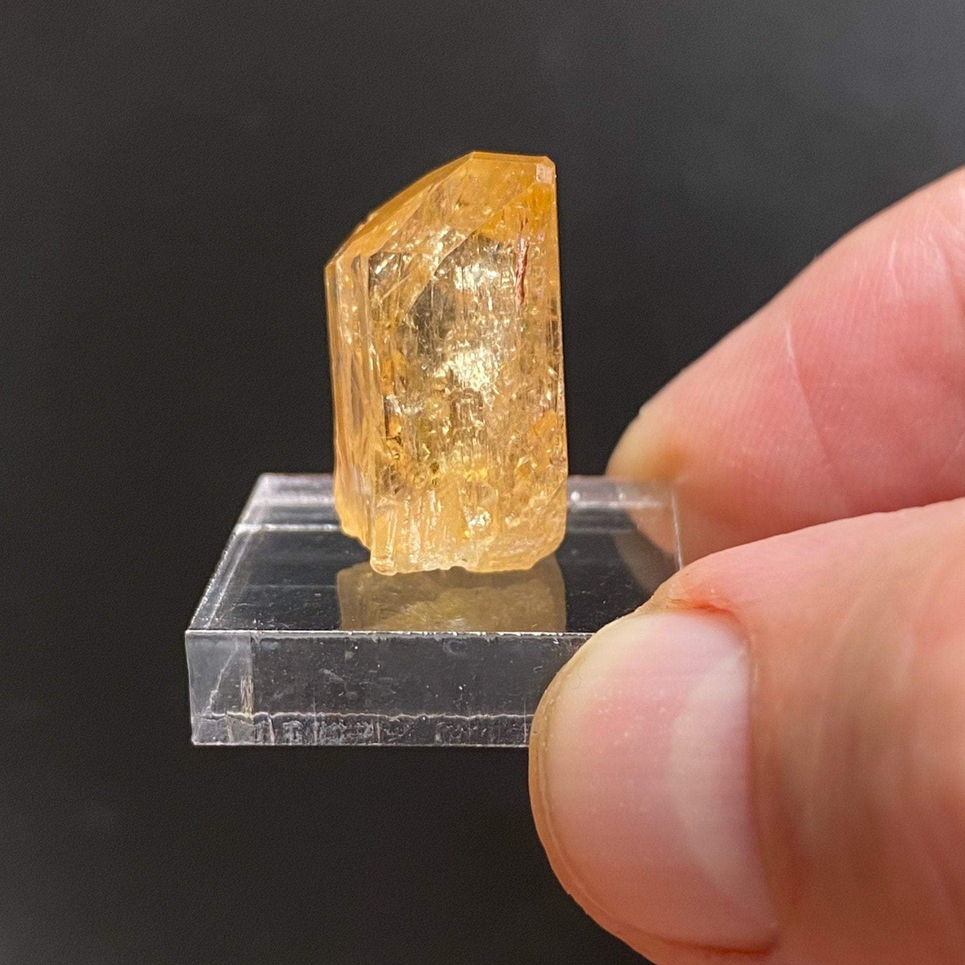 Topaz var. Imperial. The source for this fine Topaz is the Solwezi District, North-Western Province, Zambia. 100% natural. High quality, rare specimen. 8 grams.