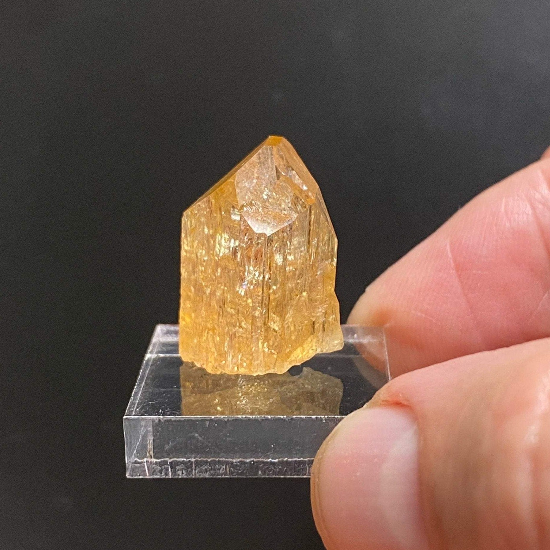 Topaz var. Imperial. The source for this fine Topaz is the Solwezi District, North-Western Province, Zambia. 100% natural. High quality, rare specimen. 8 grams.