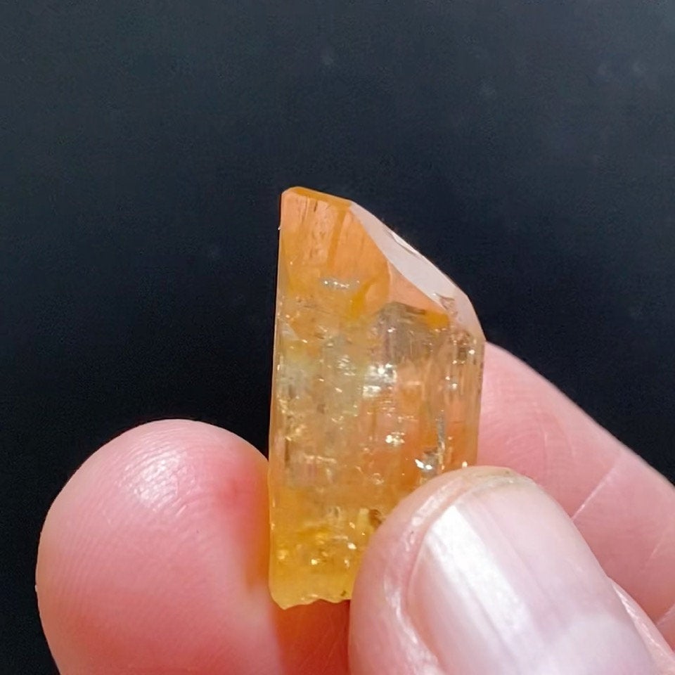 Topaz var. Imperial. The source for this fine Topaz is the Solwezi District, North-Western Province, Zambia. 100% natural. High quality, rare specimen. 8 grams.